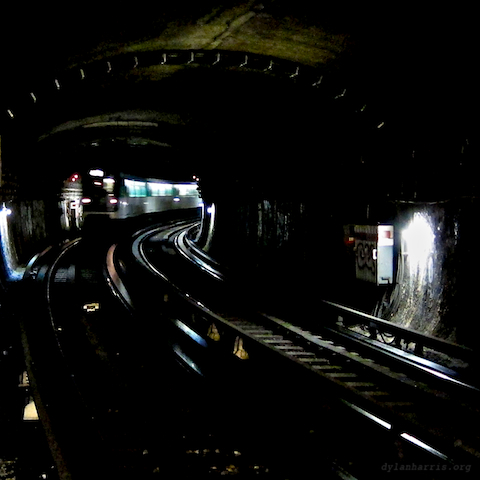 image: train approaches cité